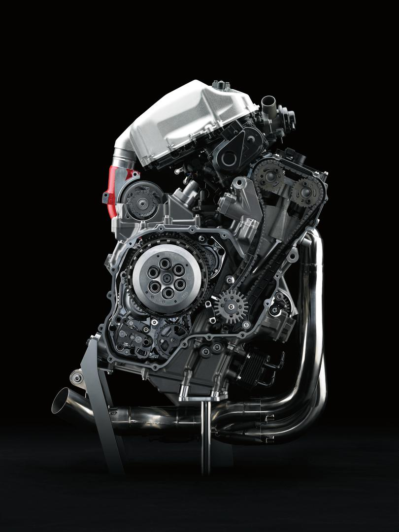 Hydraulická spojka a omezovač zpětného točivého momentu